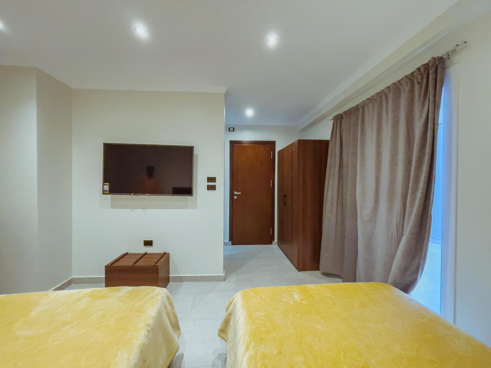 King Khufu Pyramids View Hotel Kafret el-Gabal Szoba fotó